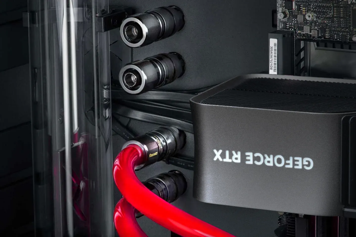 Fluid ports and hardline tubing on the Aventum X motherboard tray
