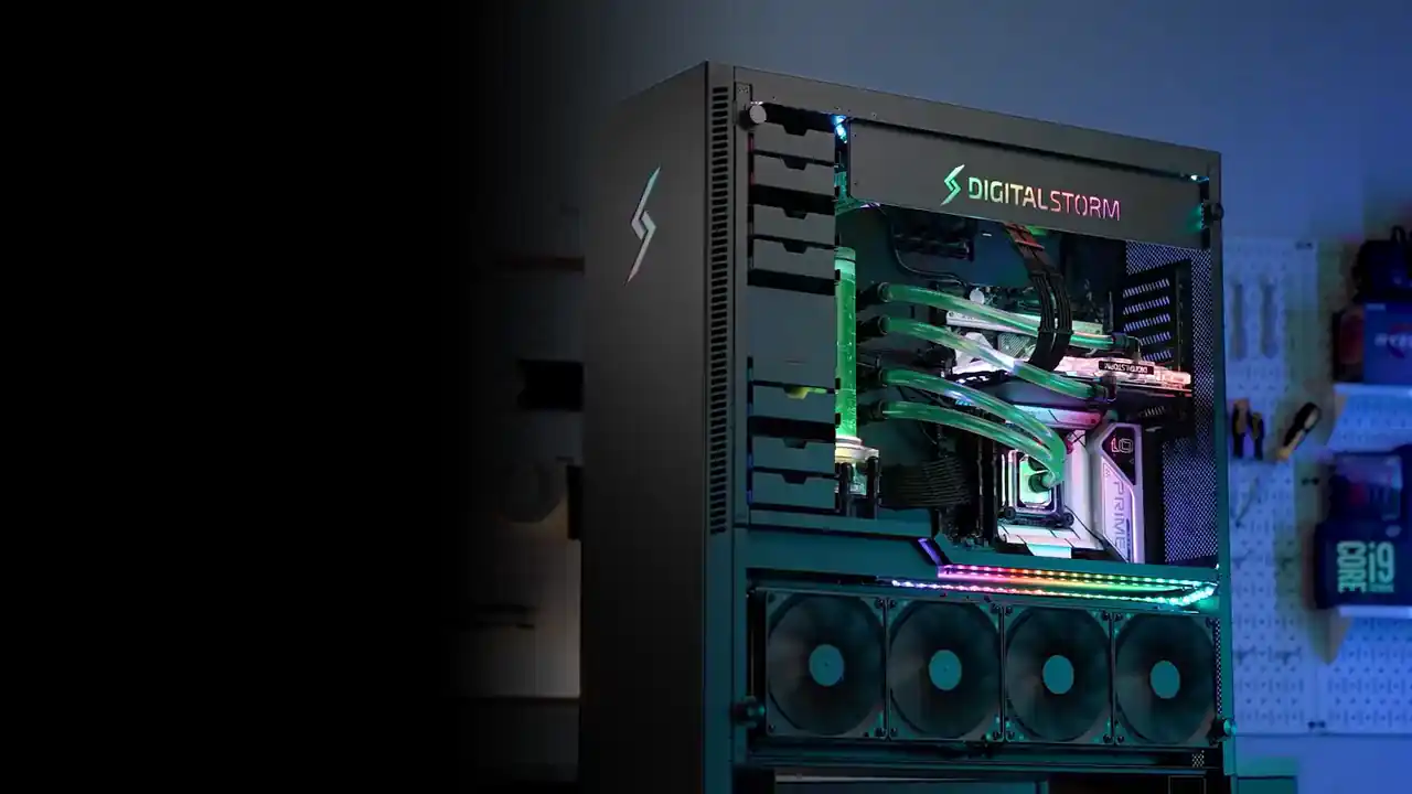A finished Digital Storm Aventum X custom PC, liquid-cooled and lit, on the build bench